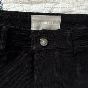 High rise black corduroy pants.